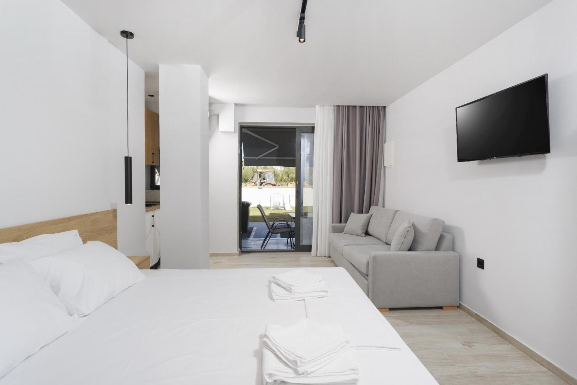 Rigas Boutique Rooms Pefkochori Exterior photo
