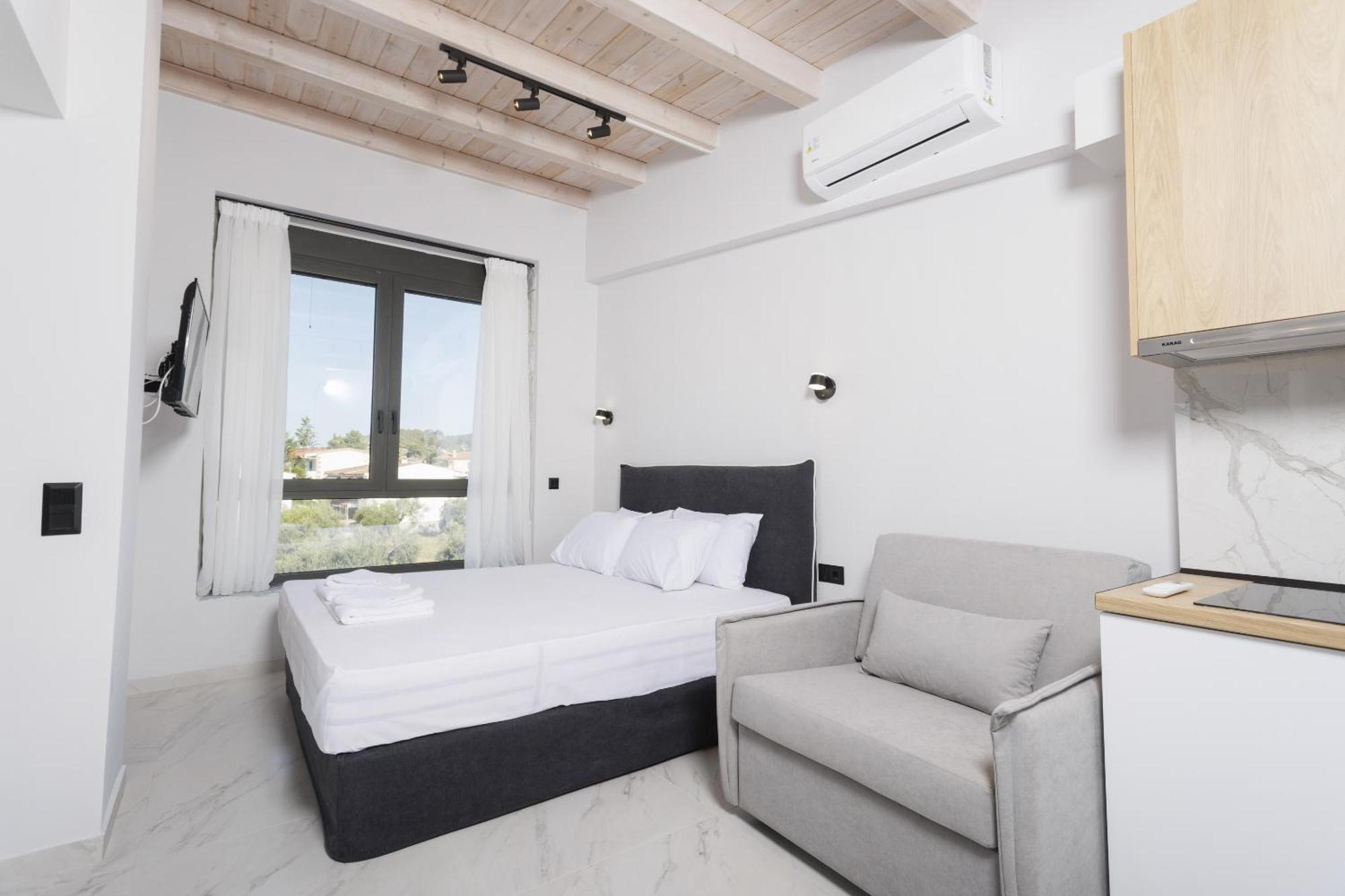 Rigas Boutique Rooms Pefkochori Exterior photo